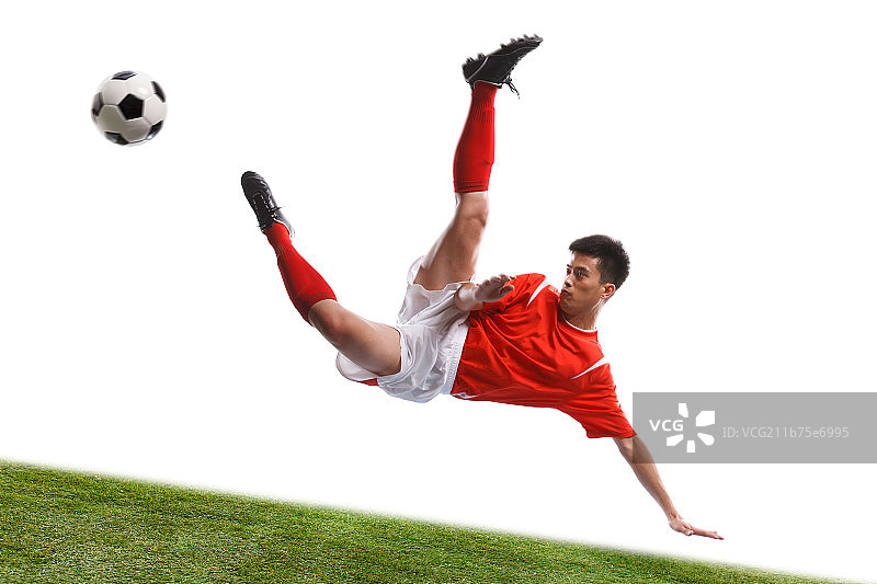 足球运动员踢球图片素材