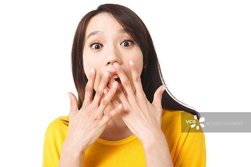 表情惊讶的青年女人图片素材