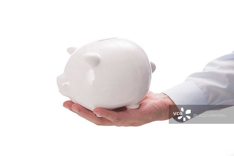 手拿存钱罐图片素材