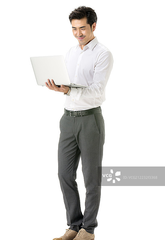 抱着电脑的商务男士图片素材