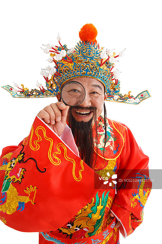 财神爷拿着放大镜图片素材