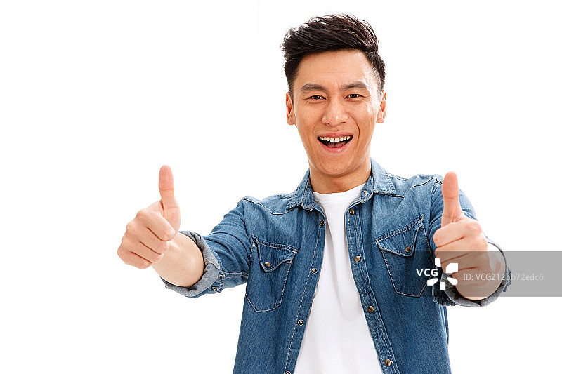 青年男人竖起大拇指图片素材