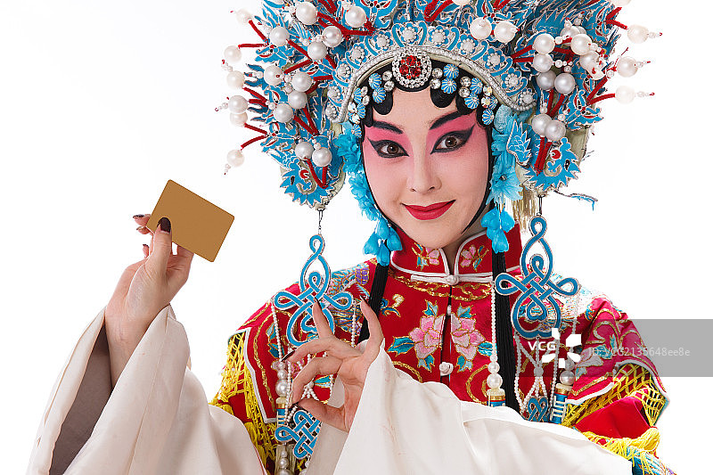 青年戏剧表演者拿着金卡图片素材