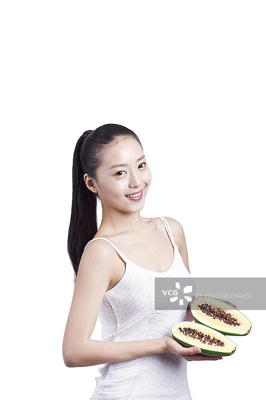 休闲女士手捧木瓜图片素材