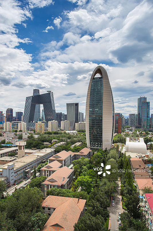 蓝天白云下的人民日报社和CCTV图片素材