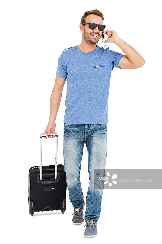 拉杆箱的快乐青年男人图片素材