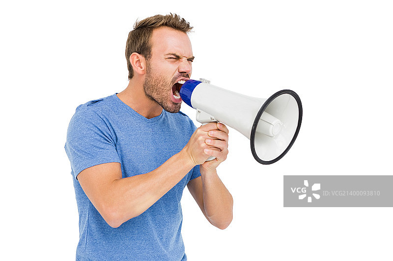 年轻男人对着喇叭大喊图片素材