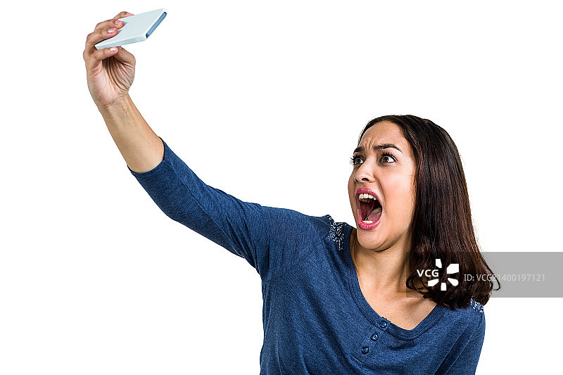 年轻女人做鬼脸图片素材