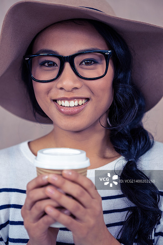 戴帽子的亚洲妇女图片素材
