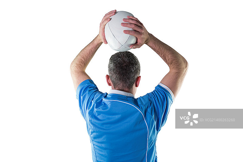 橄榄球运动员准备投球的背影图片素材