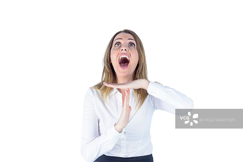 压力大的女商人要求暂停，背景是白墙图片素材