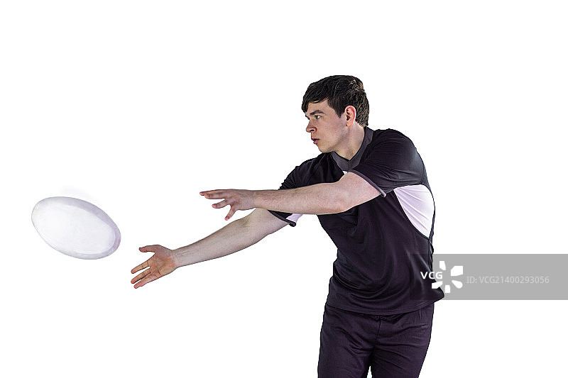 橄榄球运动员在白色背景上侧传球图片素材