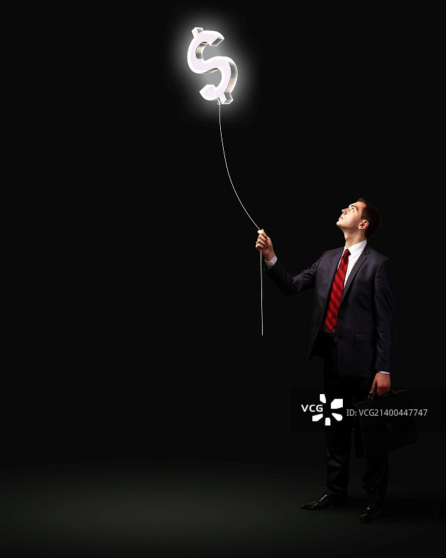 灯泡与商务人士，商业创意象征图片素材