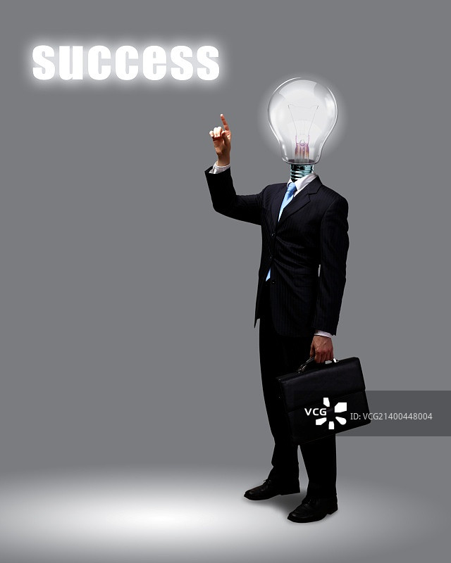 灯泡与商务人士，商业创意象征图片素材