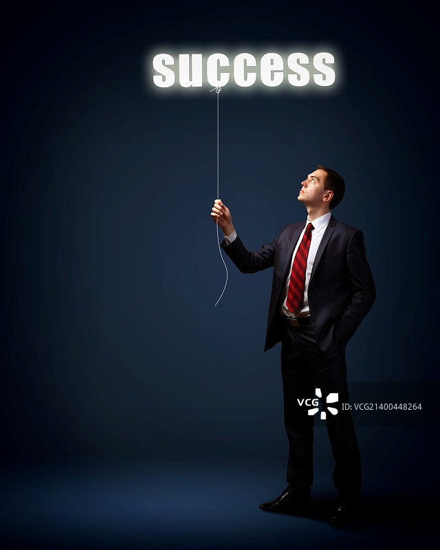 灯泡与商务人士，商业创意象征图片素材