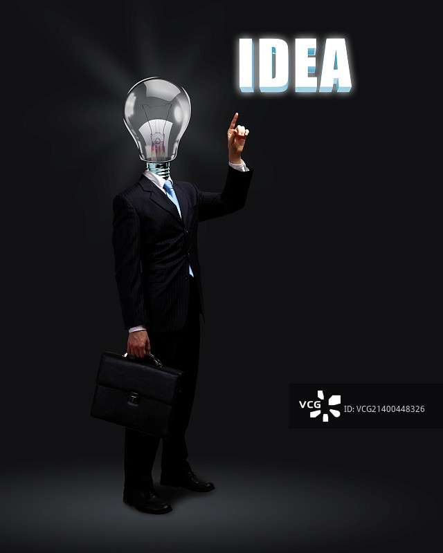 灯泡与商务人士，商业创意象征图片素材