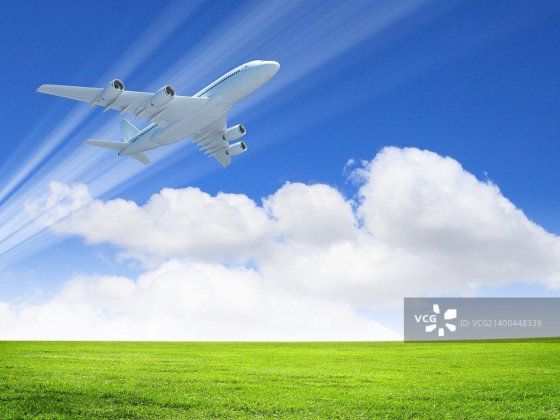 白色飞翔的客机图片素材
