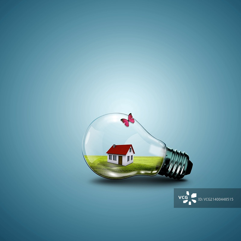 作为绿色能源象征的电灯泡和房屋图片素材