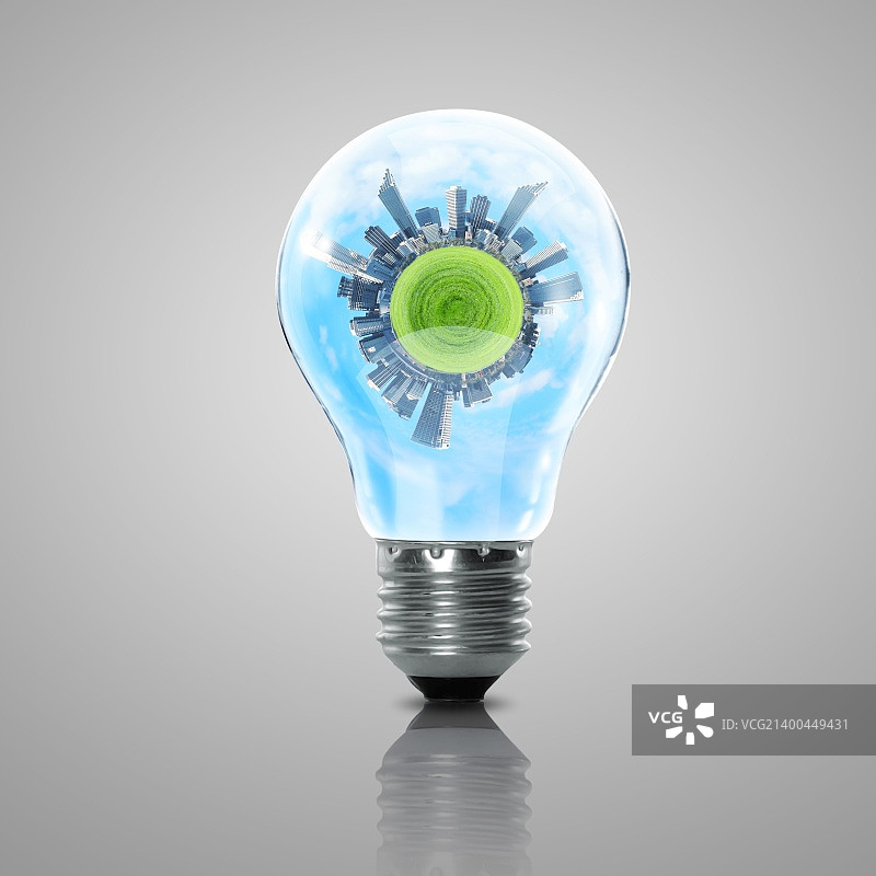 绿色能源：地球与灯泡的结合图片素材