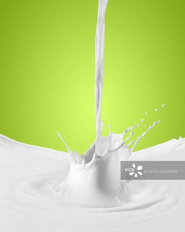 牛奶飞溅在彩色背景上的图片图片素材
