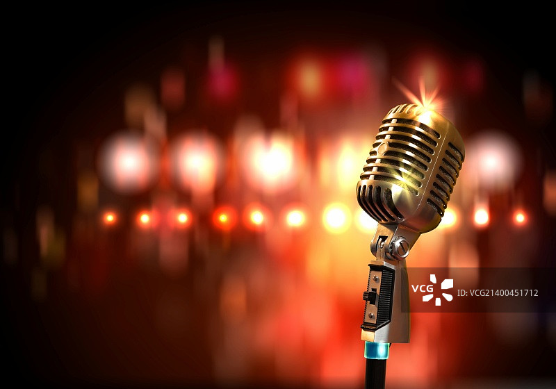 彩色灯光背景下的单个复古麦克风图片素材