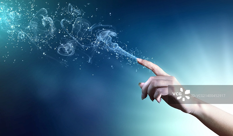 闪耀色彩背景上的魔法之手概念图图片素材