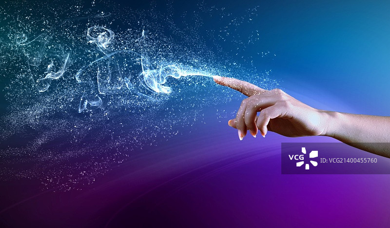 闪耀色彩背景上的魔法之手概念图图片素材