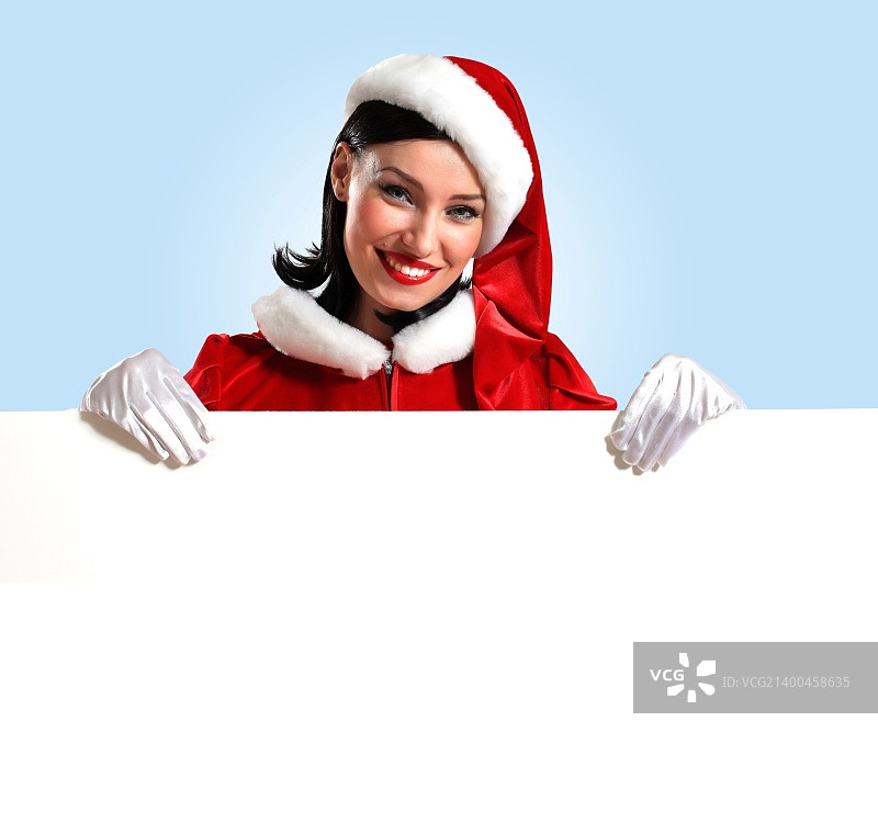 拿着空白banner的圣诞女孩图片素材