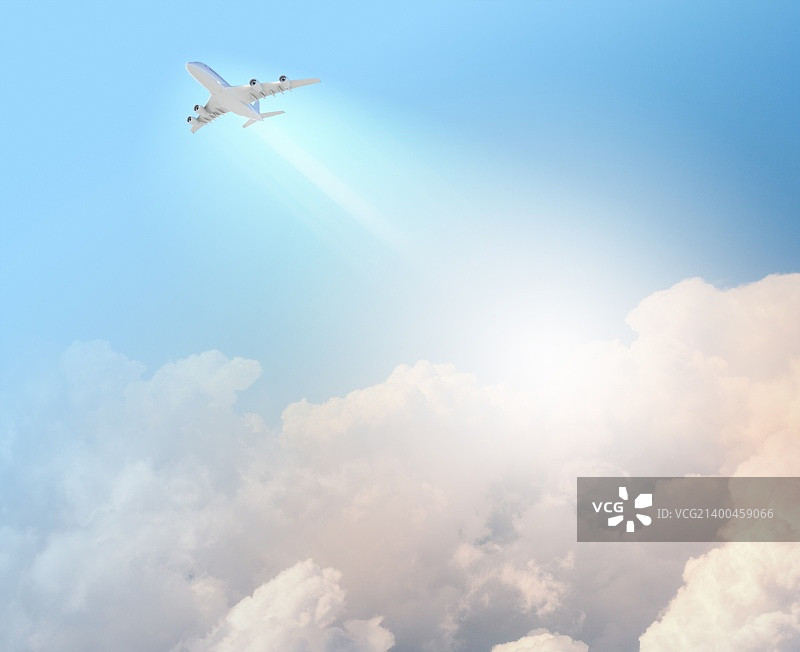 晴朗天空中的飞行飞机图片素材