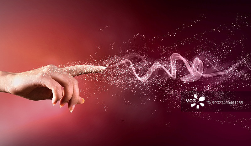 闪耀色彩背景上的魔法之手概念图图片素材