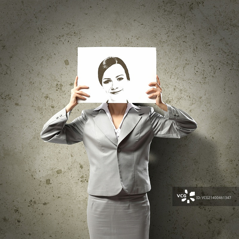 女商人持画概念照片图片素材