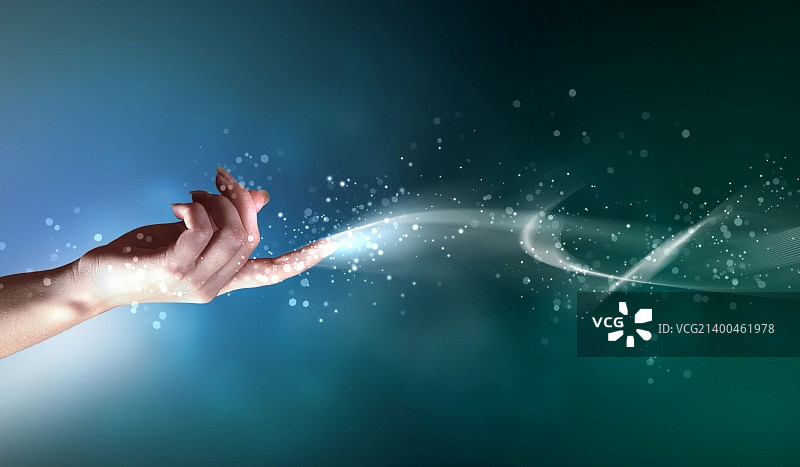 闪耀色彩背景上的魔法之手概念图图片素材