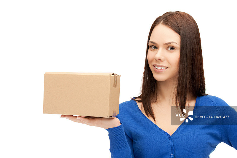 抱着纸箱的有魅力的女商人照片图片素材