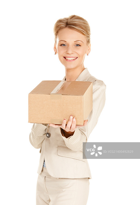 抱着纸箱的有魅力的女商人照片图片素材