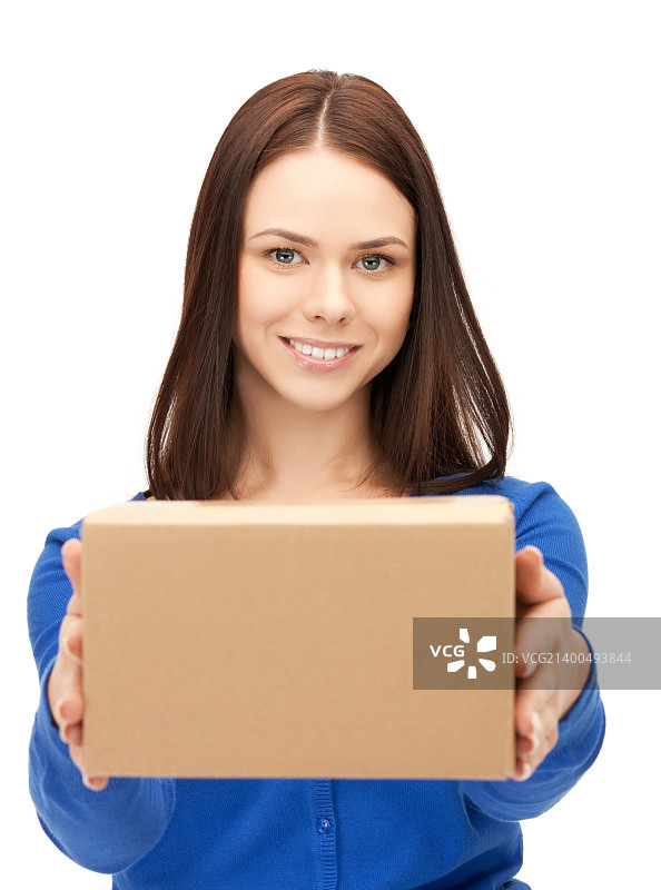 抱着纸箱的有魅力的女商人照片图片素材