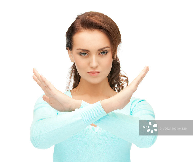 做停止手势的年轻女子图片素材