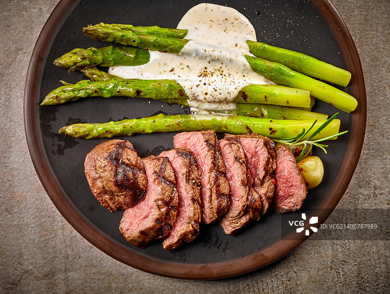 一份切片牛排芦笋图片素材