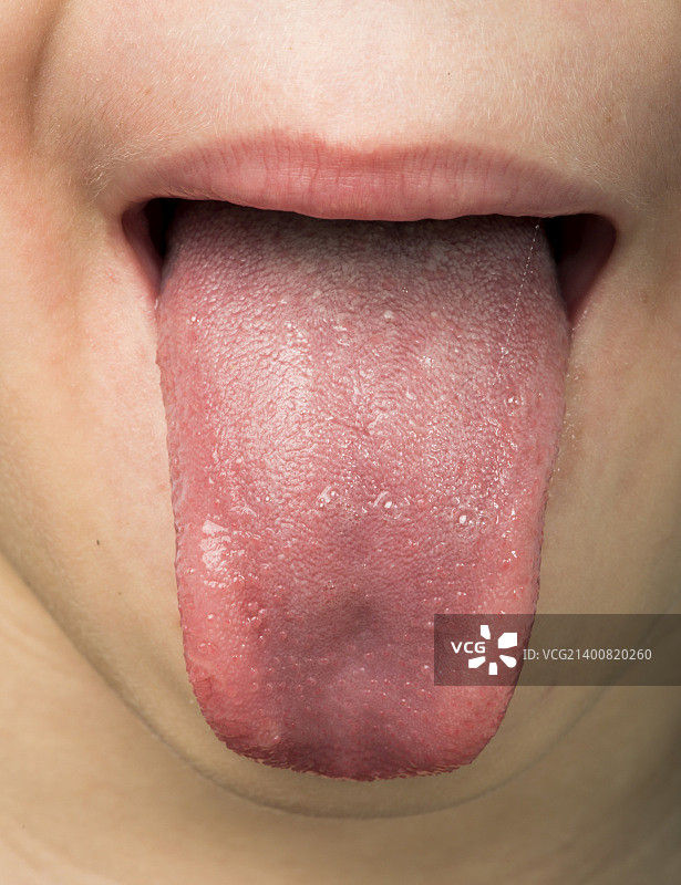 人伸出舌头图片素材