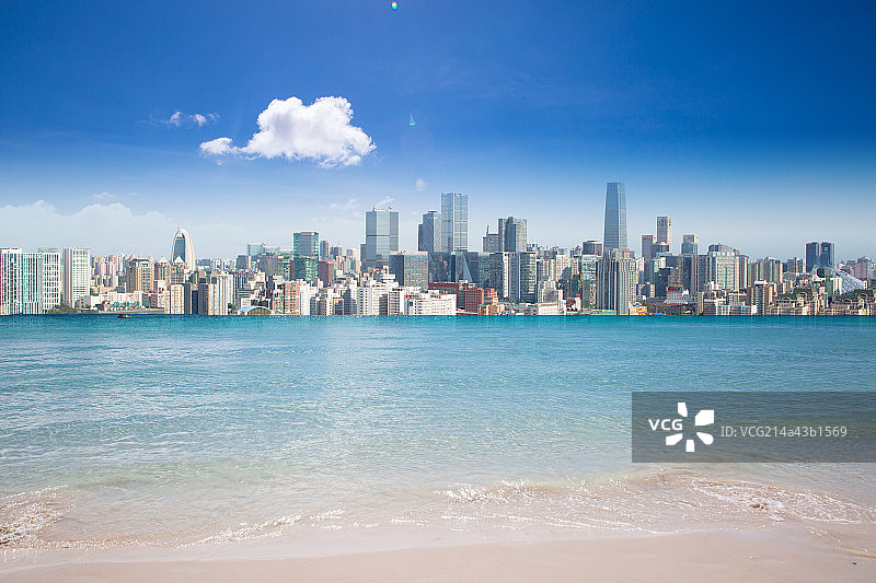 海滩远眺城市图片素材
