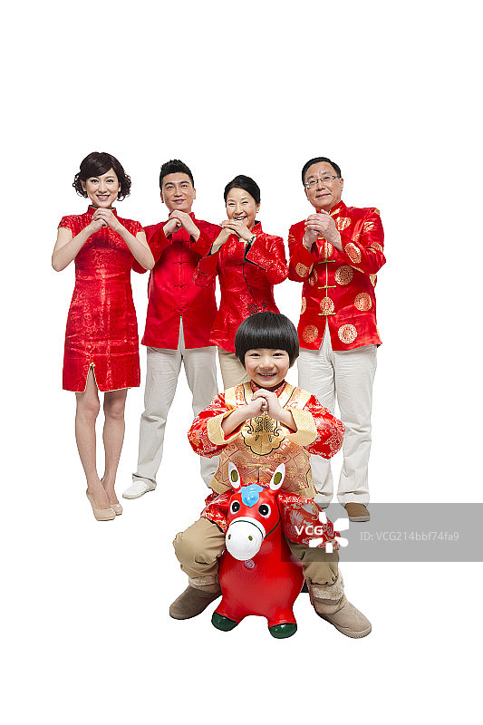 棚拍节日气氛中的唐装一家人团聚图片素材