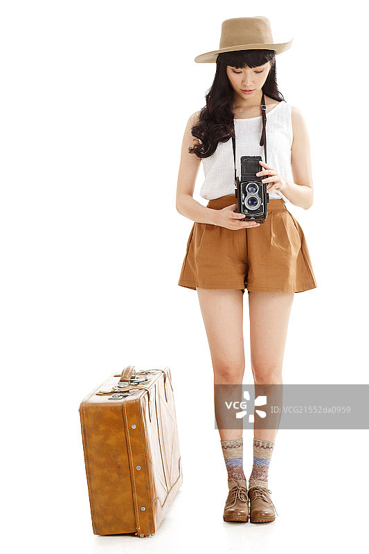 拿照相机的青年女人图片素材