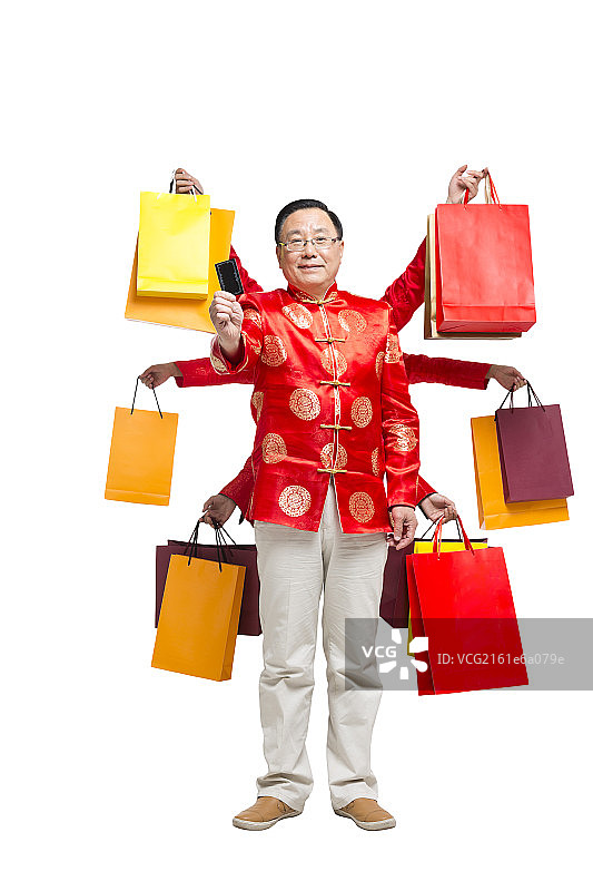 棚拍节日气氛中的唐装老男人购物图片素材