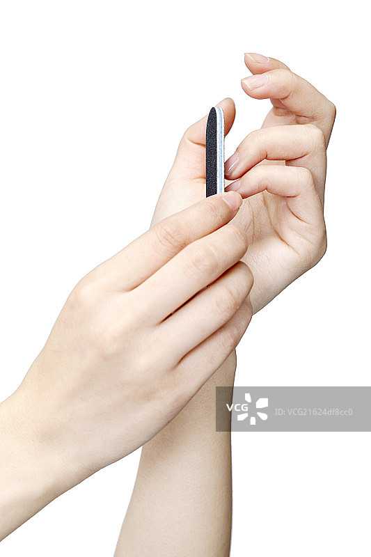 正在磨指甲的手图片素材