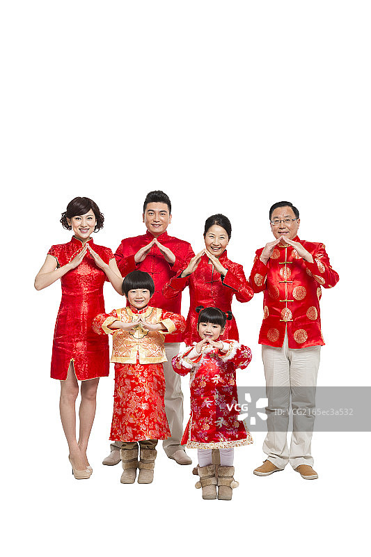 棚拍节日气氛中的唐装一家人团聚图片素材