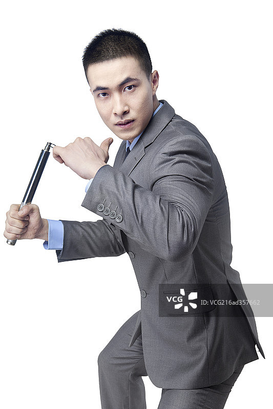 穿西装练武的商业男士图片素材