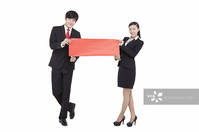 商务人士拿着红色条幅图片素材