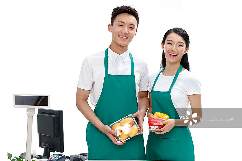 收银员拿着蔬菜和水果图片素材