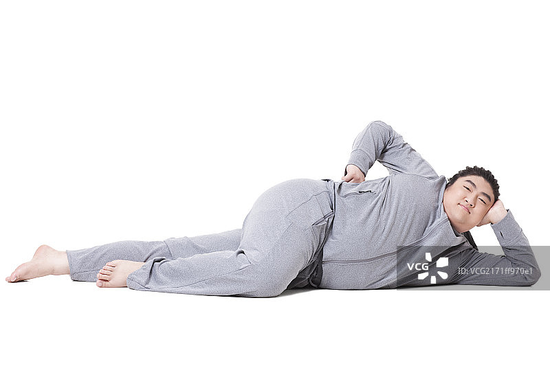 搞笑胖子侧卧图片素材