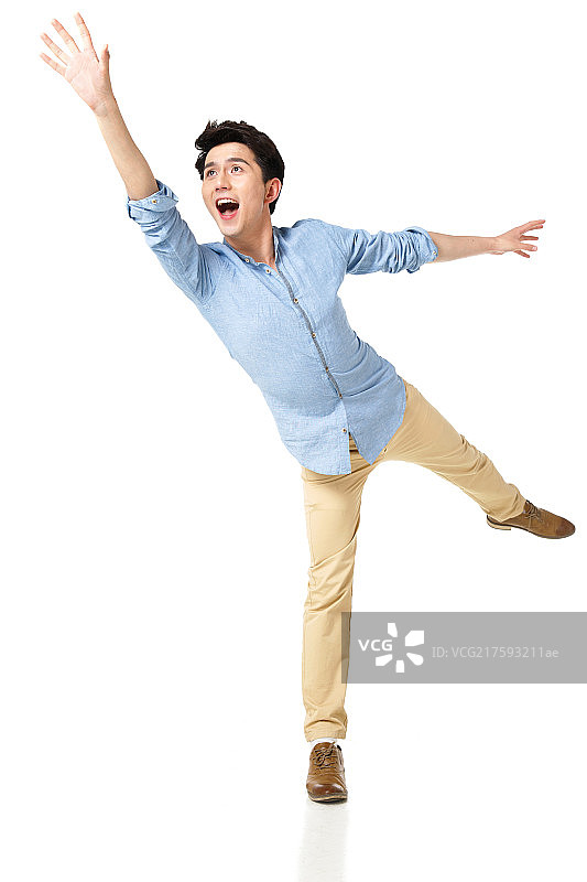 青年男人伸手抓图片素材