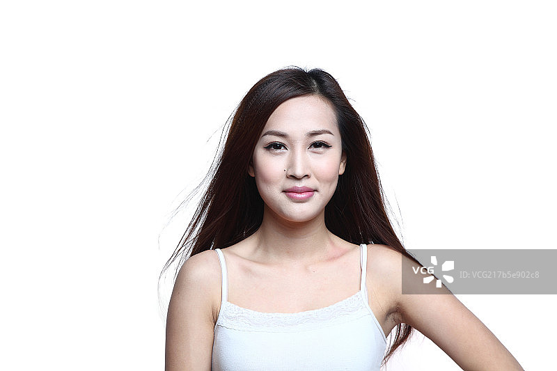 头发飘逸的年轻女人图片素材